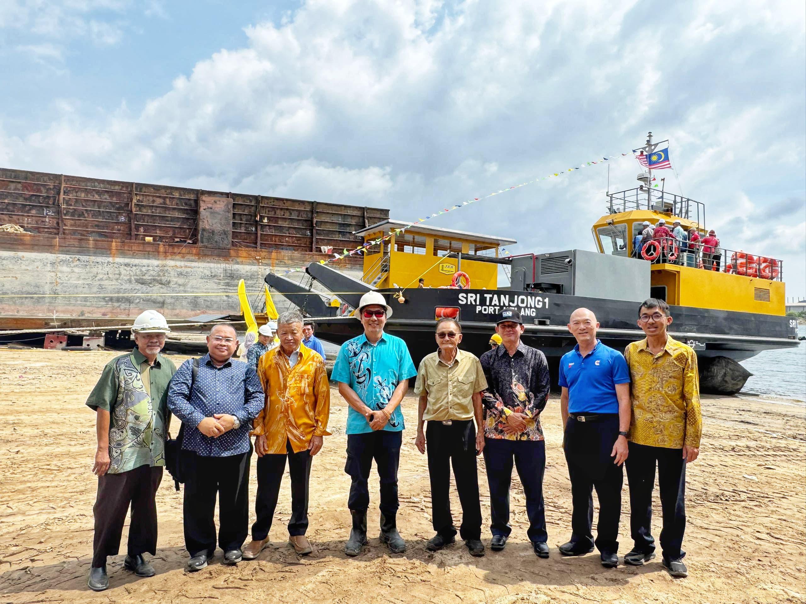Staff at the vessel handover ceremony for Sri Tanjong 1