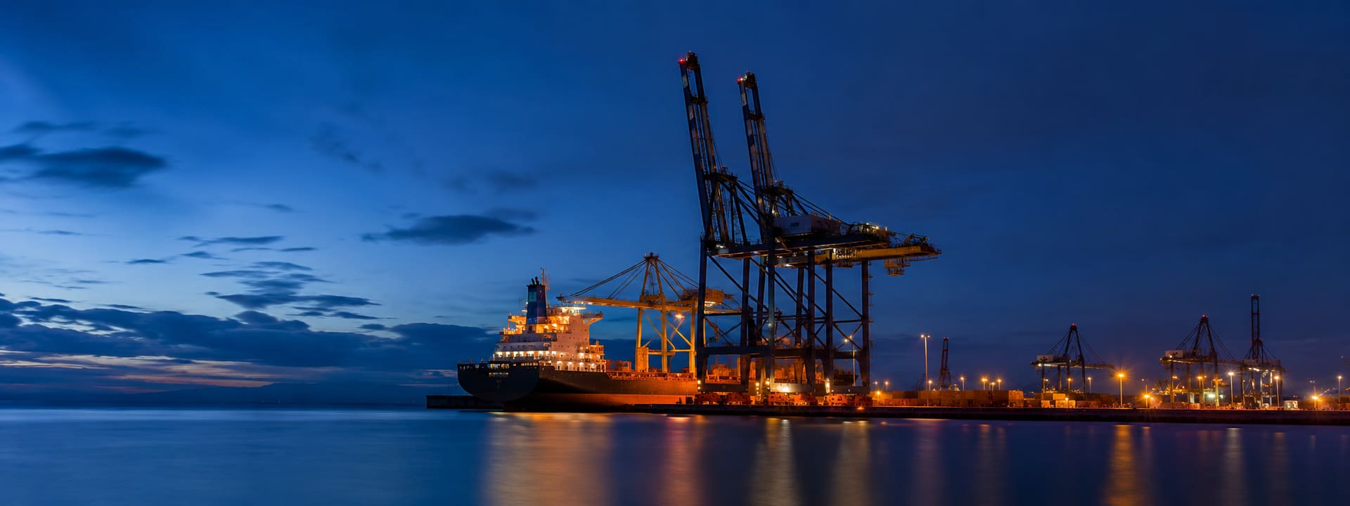 Commercial port and harbour at blue hour